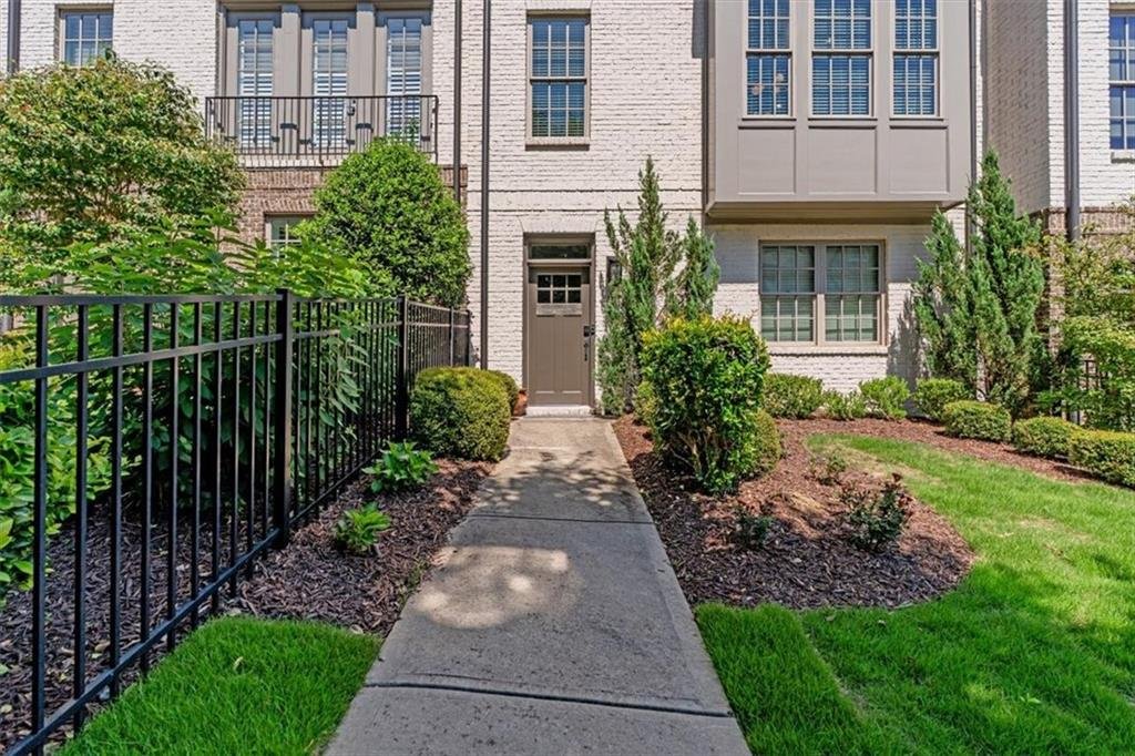 Real photo of the front entrance of a recent Ali LeCraw listing near Sandy Springs City Center, Georgia